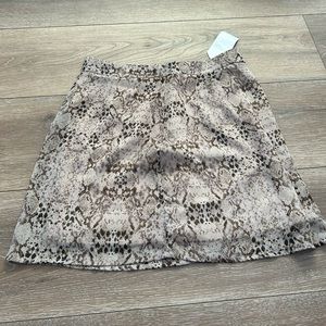 Snake skin mini skirt from boutique Sadie and Sage